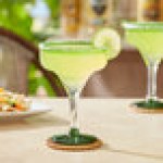 Acopa Tropic 12 oz. Margarita Glass with Green Rim and Base - Sample