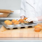 Chicago Metallic 43025 12 Cup 7.3 oz. Glazed Aluminized Steel Jumbo Crown Muffin Pan - 13 1/2