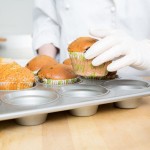 Chicago Metallic 43025 12 Cup 7.3 oz. Glazed Aluminized Steel Jumbo Crown Muffin Pan - 13 1/2