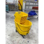 Rubbermaid® FG758088YEL WaveBrake® 35 Qt. Yellow Mop Bucket with Side Press Wringer Rubbermaid® FG758088YEL WaveBrake® 35 Qt. Yellow Mop Bucket with Side Press Wringer