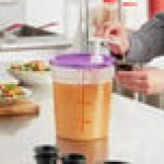 Choice Condiment Pump Kit with 1 oz. Pump and 4 Qt. Round Translucent Container with Purple Lid