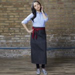 Uncommon Chef 3125 Confetti Denim Customizable Poly-Cotton West End Bistro Apron with Red Webbing and 1 Pocket - 33