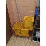 Lavex Wet Mop Kit with 35 Qt. Yellow Mop Bucket, Wet Floor Sign, Handle, and 12 Mop Heads Lavex Wet Mop Kit with 35 Qt. Yellow Mop Bucket, Wet Floor Sign, Handle, and 12 Mop Heads
