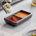 Acopa Heika 1 oz. Black Matte Textured Rectangular 2-Compartment Stoneware Sauce Dish - 12/Case