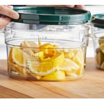 Vigor 2 Qt. Clear Round Polycarbonate Food Storage Container and Green Lid - 12/Pack
