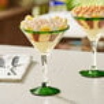 Acopa Tropic 15 oz. Martini Glass with Green Rim and Base - Sample