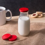 Acopa Red Solid Milk Bottle Lid - 12/Case Acopa Red Solid Milk Bottle Lid - 12/Case