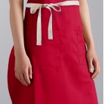Choice Red Poly-Cotton Adjustable Bib Apron with 2 Pockets and Natural Webbing Accents - 32