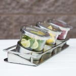 Cal-Mil 1850-4-55NL Mixology Stainless Steel 3 Jar Horizontal Display with 16 oz. Jars, Notched Lids, and Cooling Pucks - 13 1/2