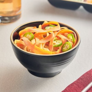 Acopa Ugoki 10 oz. Matte Black Melamine Bowl with Ivory Rim - 12/Pack Acopa Ugoki 10 oz. Matte Black Melamine Bowl with Ivory Rim - 12/Pack