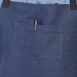 Uncommon Chef 3108 Indigo Customizable 100% Cotton Denim Radical Bib Apron with Black Webbing and 3 Pockets - 34 Uncommon Chef 3108 Indigo Customizable 100% Cotton Denim Radical Bib Apron with Black Webbing and 3 Pockets - 34
