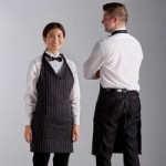 Choice Black and White Pinstripe Poly-Cotton Standard Bib Apron with 2 Pockets - 34