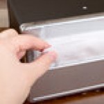 Vollrath 6515-06 Black Two Sided Tabletop Minifold Napkin Dispenser with Chrome Faceplate Vollrath 6515-06 Black Two Sided Tabletop Minifold Napkin Dispenser with Chrome Faceplate