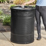 Lancaster Table & Seating 55 Gallon Heavy-Duty Round Black Steel Perforated Outdoor Trash Can with Flat Lid