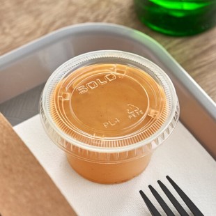 Solo PL4N Large Clear Plastic Souffle / Cup Lid - 125/Pack Solo PL4N Large Clear Plastic Souffle / Cup Lid - 125/Pack