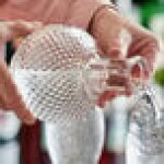 Acopa 32 oz. Cut Glass Sphere Whiskey Decanter