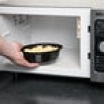Pactiv Newspring OC16B 16 oz. Black VERSAtainer Oval Microwavable Container with Lid - 150/Case