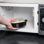 Pactiv Newspring OC16B 16 oz. Black VERSAtainer Oval Microwavable Container with Lid - 150/Case
