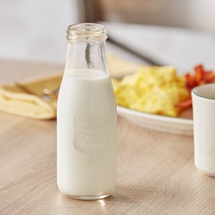 Acopa 14 oz. Embossed Glass Milk Bottle - 12/Case