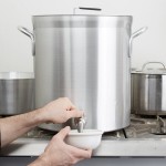 Vollrath 68631 Wear-Ever Classic Select 32 Qt. Heavy Duty Aluminum Stock Pot with Faucet Vollrath 68631 Wear-Ever Classic Select 32 Qt. Heavy Duty Aluminum Stock Pot with Faucet