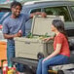 CaterGator CG65TANW Tan 65 Qt. Mobile Rotomolded Outdoor Cooler / Ice Chest