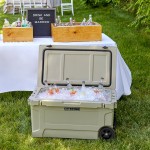 CaterGator CG65TANW Tan 65 Qt. Mobile Rotomolded Outdoor Cooler / Ice Chest