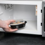 Pactiv Newspring OC08B 8 oz. Black VERSAtainer Oval Microwavable Container With Lid - 150/Case