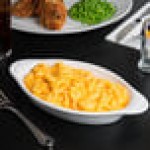 Tuxton BWN-150 17 oz. White Oval China Rarebit - 12/Case