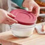 Anchor Hocking 1.5 Qt. Glass Mixing Bowl with Red Plastic Lid 91856L20 - 2/Set