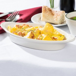 Tuxton BEN-120 12 oz. Eggshell Oval China Welsh Rarebit - 12/Case