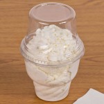 Fabri-Kal Indulge DLDE16/24TNH Clear Tall Dome PET Lid for 5 oz., 8 oz., and 12 oz. Sundae Cups - No Hole - 1,008/Case
