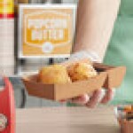 Carnival King 1 lb. Medium Two-Compartment Paper Food Tray 6 1/2 Carnival King 1 lb. Medium Two-Compartment Paper Food Tray 6 1/2
