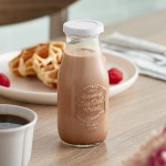 Acopa 10 oz. Embossed Glass Milk Bottle - 12/Case Acopa 10 oz. Embossed Glass Milk Bottle - 12/Case