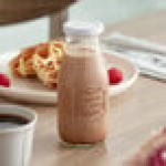 Acopa 10 oz. Embossed Glass Milk Bottle - 12/Case Acopa 10 oz. Embossed Glass Milk Bottle - 12/Case