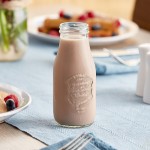 Acopa 10 oz. Embossed Glass Milk Bottle - 12/Case Acopa 10 oz. Embossed Glass Milk Bottle - 12/Case