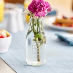 Acopa 10 oz. Embossed Glass Milk Bottle - 12/Case Acopa 10 oz. Embossed Glass Milk Bottle - 12/Case