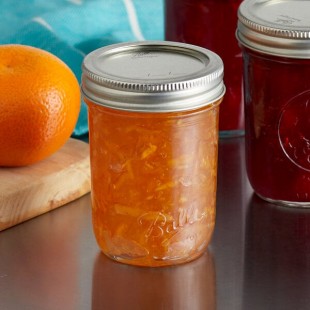 Ball 60000ZFP 8 oz. Half-Pint Regular Mouth Glass Canning Jar with Silver Metal Lid and Band - 12/Case