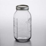 Ball 60000ZFP 8 oz. Half-Pint Regular Mouth Glass Canning Jar with Silver Metal Lid and Band - 12/Case
