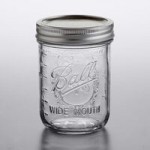 Ball 60000ZFP 8 oz. Half-Pint Regular Mouth Glass Canning Jar with Silver Metal Lid and Band - 12/Case