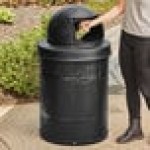 Lancaster Table & Seating 32 Gallon Heavy-Duty Round Black Steel Perforated Outdoor Trash Can with Plastic Dome Lid