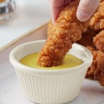 Acopa 4 oz. Bone White Fluted Melamine Ramekin - 12/Case Acopa 4 oz. Bone White Fluted Melamine Ramekin - 12/Case