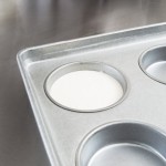 Chicago Metallic 41006 Glazed Aluminized Steel 6 Mold 7.70 oz. Individual Hamburger Bun / Muffin Top / Cookie Pan - 12