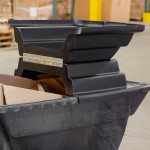 Rubbermaid® 0.5 Cubic Yard Black Rotomolded Tilt Truck / Trash Cart with Hinged Dome Lid (850 lb.)