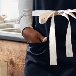 Choice Navy Blue Poly-Cotton Adjustable Bib Apron with 2 Pockets and Natural Webbing Accents - 32