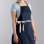Choice Navy Blue Poly-Cotton Adjustable Bib Apron with 2 Pockets and Natural Webbing Accents - 32