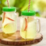 Acopa Rustic Charm 16 oz. Drinking Jar with Handle and Green Metal Lid with Straw Hole - 12/Case