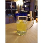 Acopa Tropic 50 oz. Glass Pitcher with Blue Rim