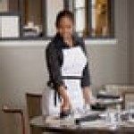 Choice White Poly-Cotton Adjustable Bib Apron with 2 Pockets and Black Webbing Accents - 32 Choice White Poly-Cotton Adjustable Bib Apron with 2 Pockets and Black Webbing Accents - 32