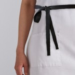 Choice White Poly-Cotton Adjustable Bib Apron with 2 Pockets and Black Webbing Accents - 32 Choice White Poly-Cotton Adjustable Bib Apron with 2 Pockets and Black Webbing Accents - 32