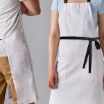 Choice White Poly-Cotton Adjustable Bib Apron with 2 Pockets and Black Webbing Accents - 32 Choice White Poly-Cotton Adjustable Bib Apron with 2 Pockets and Black Webbing Accents - 32
